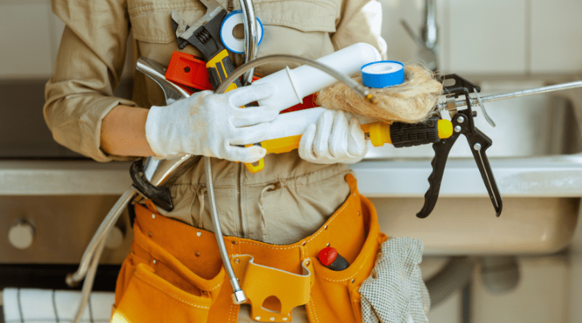 plumber with tools